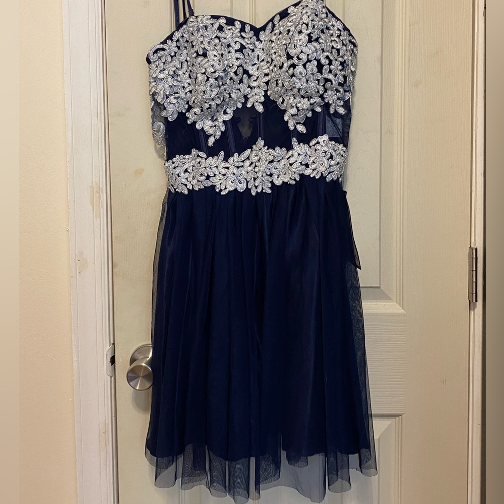 Macy’s navy blue mini dress with sequen silver detailing. Size 7